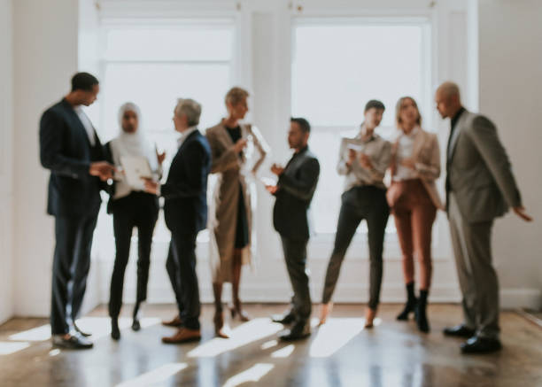 istock Diverse business people talking to each other 2157026700