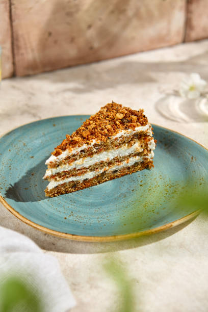 istock Aesthetic Slice of Authentic Carrot Cake in Sunlight with Natural Shadows 2157026937