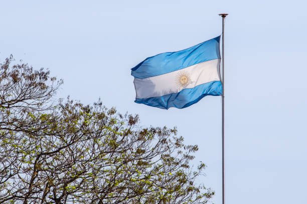 Argentinian flag flies on top of a mast