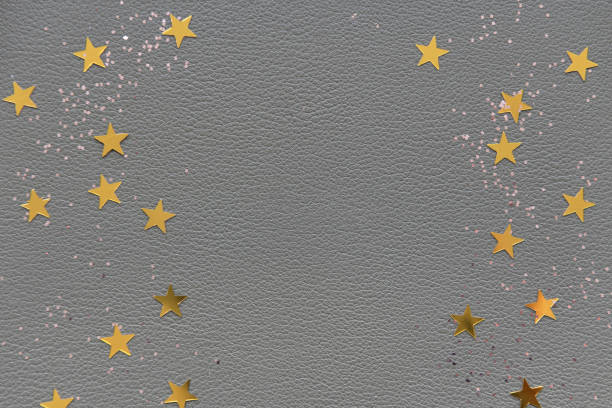 Golden stars on a gray background