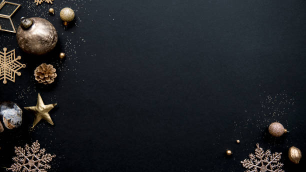 istock Christmas ornaments on a black background 2157028169