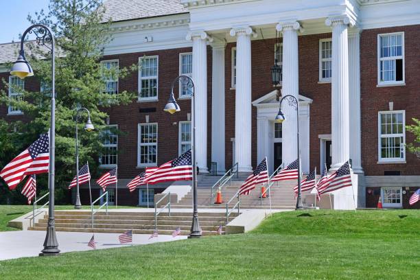 istock School building decorated with American flags for Memorial Day 2157028307