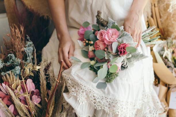 istock Woman holding a beautiful vibrant bouquet 2157032982