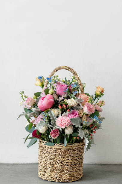 istock Basket full of blossoming flowers 2157035593