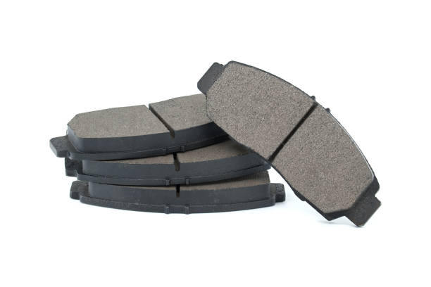 Set of auto brake pads isolated on white background, maintenance of the braking system