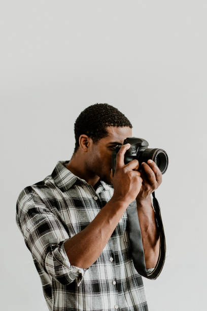 istock Male photographer taking a photo 2157040538