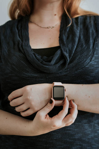 istock Closeup of a pink smartwatch 2157040701