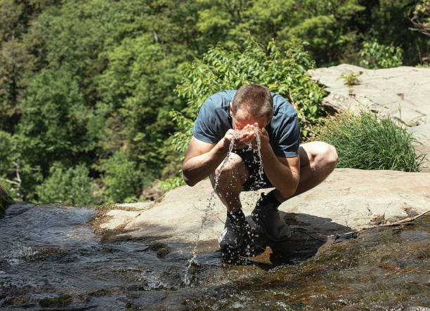 istock A traveler washes up in a stream 2157041511