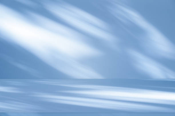 istock Wall interior background, studio, and backdrops show products. with shadow from window color white and blue light. background for text insertion and presentation of product 2157041602
