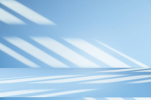 istock Wall interior background, studio, and backdrops show products. with shadow from window color white and blue light. background for text insertion and presentation of product 2157041665