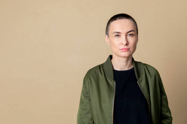 istock Skinhead woman in studio shoot 2157043035