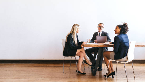 istock Businesspeople brainstorming in a meeting 2157043256
