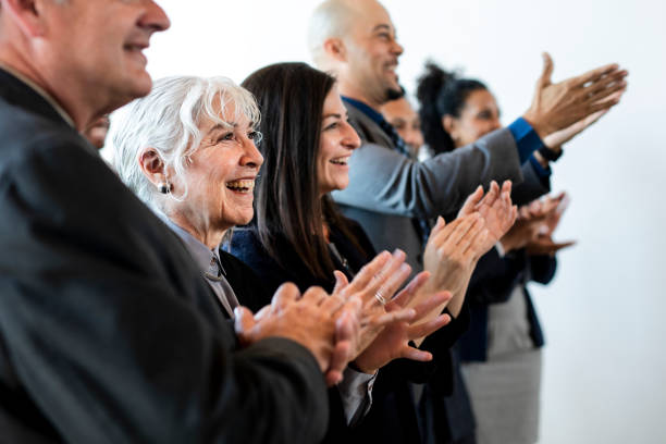 istock Diverse business people applauding with joy 2157043314