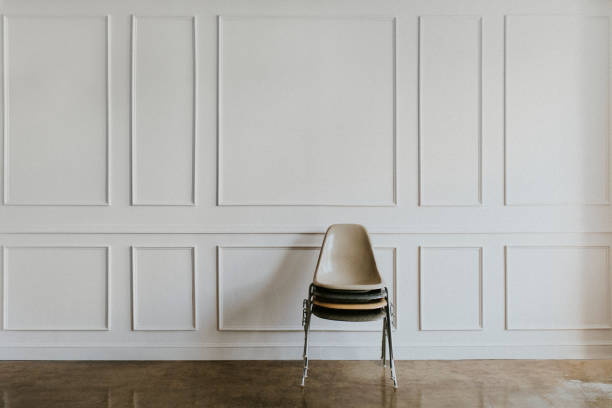 istock Chairs stacked on top of each other 2157043418