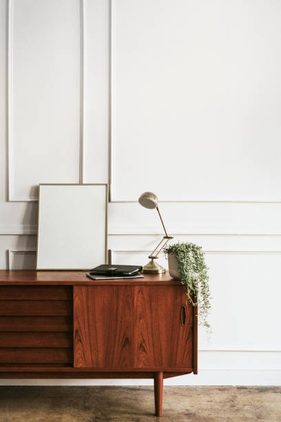 istock Wooden cabinet against a white wall 2157043441