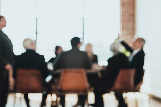 istock Businesspeople brainstorming in a meeting 2157043567