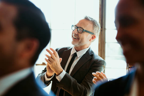 istock Diverse business people applauding with joy 2157043621