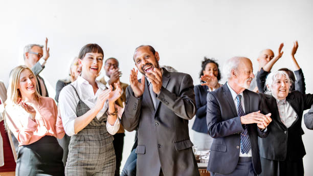 istock Diverse business people applauding with joy 2157043639