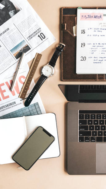Laptop on a messy desk