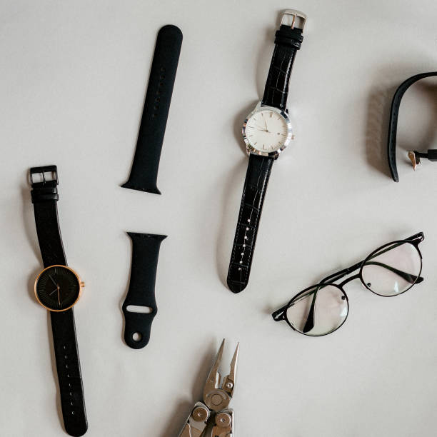istock Watches and a plier on a table 2157044792