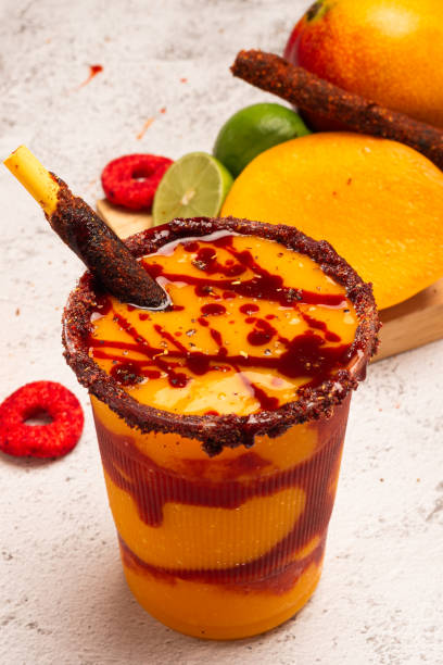 istock Mangonada, typical mexican mango smoothie with chamoy sauce and lime juice. 2157047140