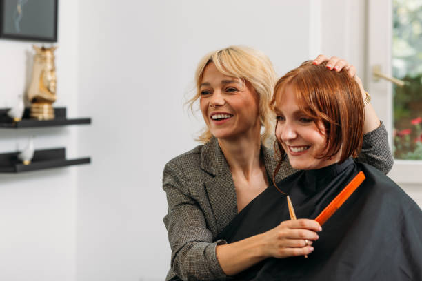 istock Hairdresser smiling with her client 2157047882