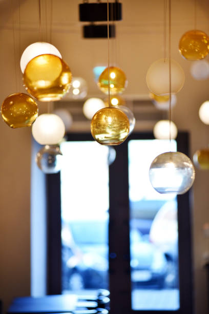 istock Hanging glass lamps in a room 2157049698