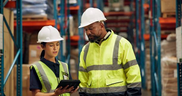 istock Team, tablet and checklist for inventory in warehouse, technology and research for logistics solutions. Workers, digital app and stock taking for ecommerce and online order in distribution center 2157050069