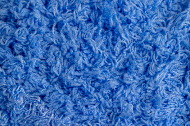 istock new soft blue threads with traces of other threads close-up 2157051011