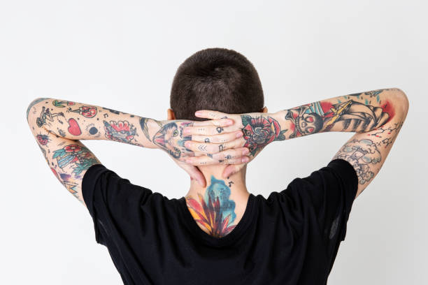 istock Skinhead tattooed model in black T shirt 2157052972