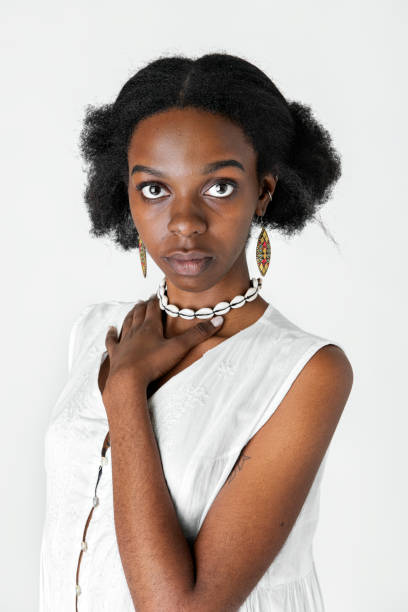 istock Confident black girl holding her necklace 2157053075