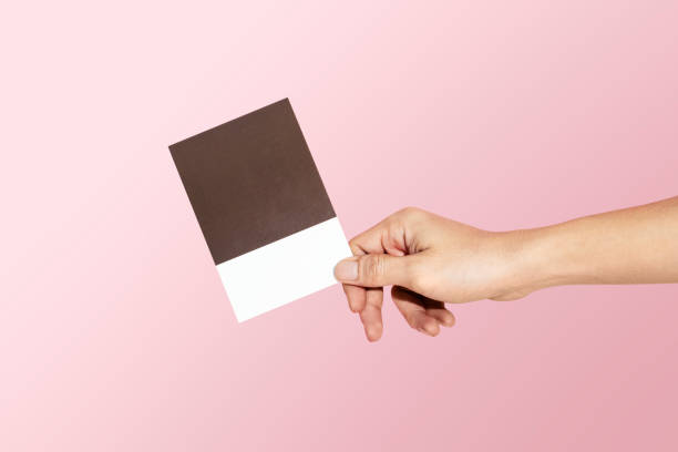 istock Feminine hand holding a color swatch 2157055242