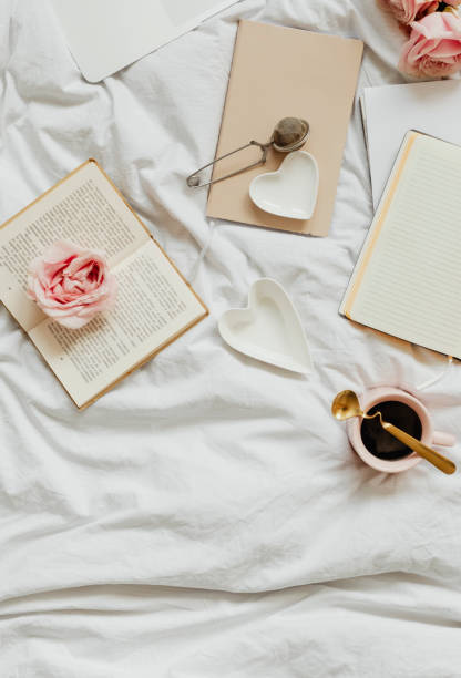 istock Romantic and feminine flat lay on a bed 2157055709