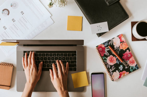 istock Female blogger working on her laptop at home 2157055922