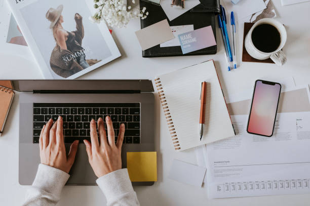 istock Female blogger working on her laptop at home 2157055932