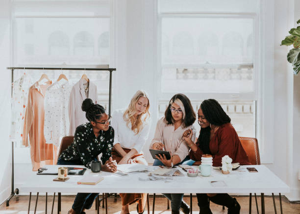 istock Young female designer in a boutique 2157055967