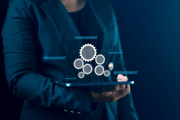 istock Tablet held by a businessman shows virtual screen with organizational management, highlighting teamwork, unity, and successful collaboration in reaching corporate goals 2157056949