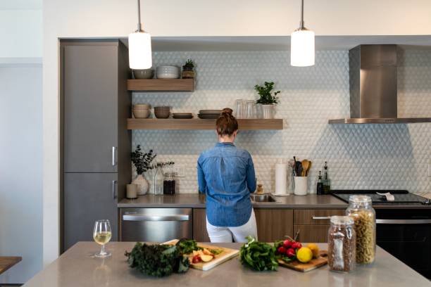 istock Woman cooking vegan dinner in the kitchen 2157059416