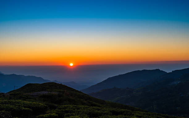 istock gloomy Sunrise over the mountain 2157060583