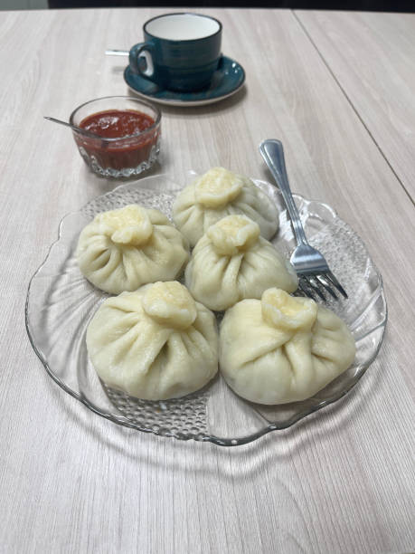 istock Khinkali with beef on a plate in a cafe. 2157061141