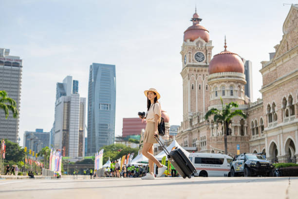 tourist wandering around kuala lumpur