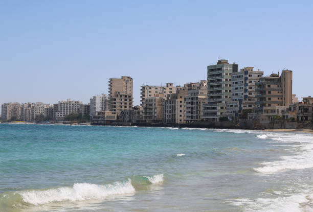 istock Buildings in Ghost town Varosha with  Beautiful Beach View 2157061528