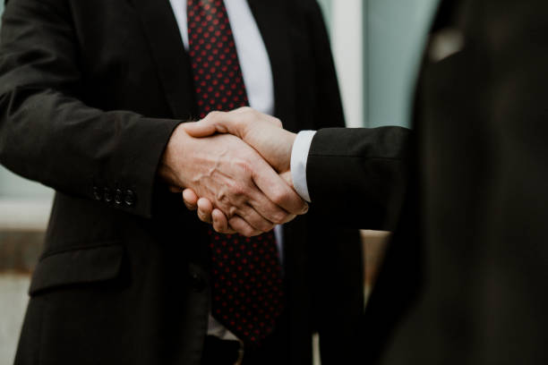istock Businessmen making a business deal 2157061902