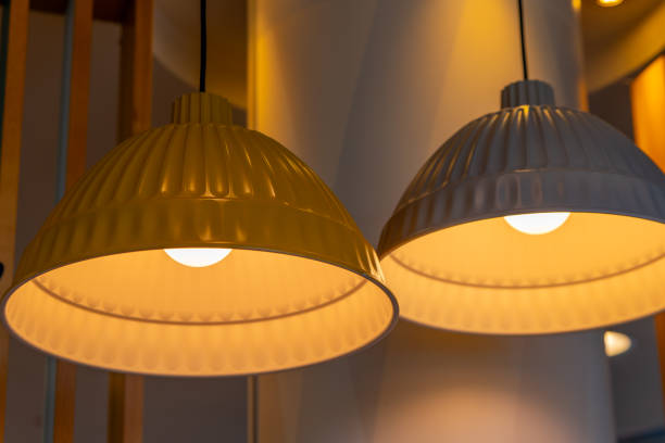 istock yellow and white hanging lamps with light bulbs in a modern interior 2157062354