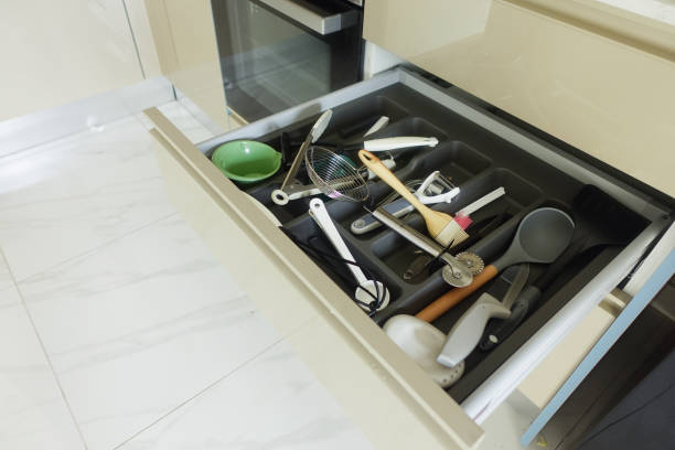 istock Close up of messy kitchen utensil drawer. 2157062698
