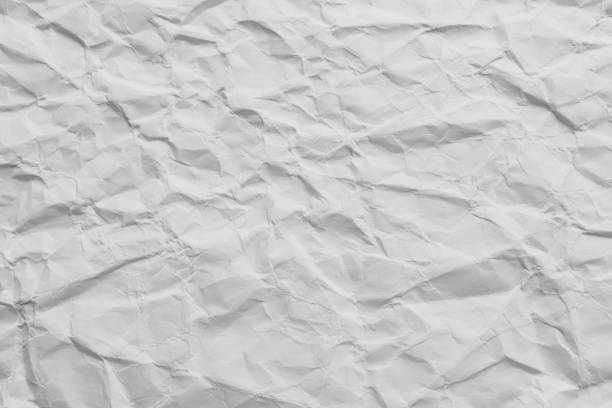 istock Clean white paper, wrinkled, abstract background. 2157063482