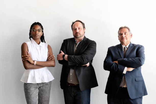 istock Diverse business people standing in a row 2157064380
