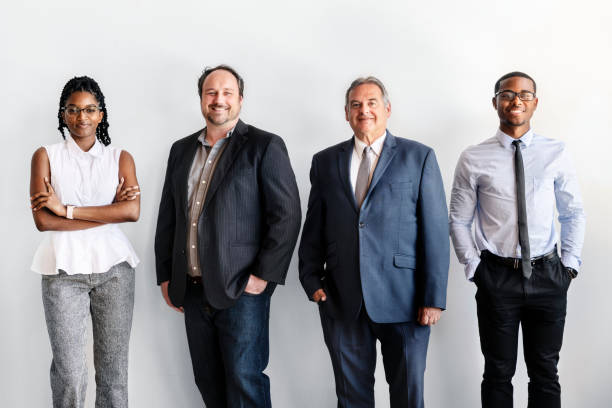 istock Diverse business people standing in a row 2157064384