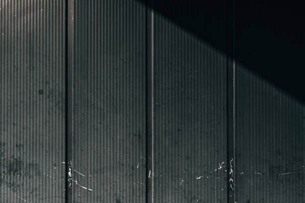 istock Worn metallic facade of an old industrial building 2157067280