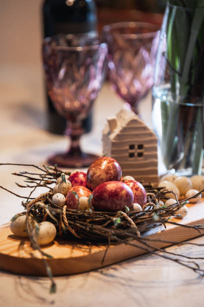 apples, nuts and other decorative christmas decorations lay on a table